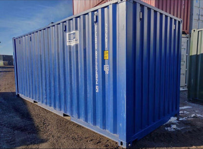 Contenedor 30 pies con puerta garaje azul