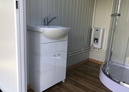 Contenedor sanitario +wc + ducha + cisterna